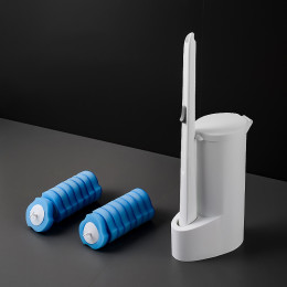Disposable toilet brush with cleaning solution